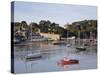 View Across River Estuary to Town Wall Quay and Harbour with Moored Boats on Calm Water, Wales-Pearl Bucknall-Stretched Canvas