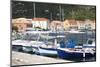 View across the Harbour to Colourful Waterfront Buildings-Ruth Tomlinson-Mounted Photographic Print