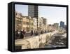 View Along the Malecon, People Sitting on the Seawall Enjoying the Evening Sunshine, Havana, Cuba-Lee Frost-Framed Stretched Canvas