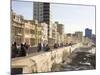 View Along the Malecon, People Sitting on the Seawall Enjoying the Evening Sunshine, Havana, Cuba-Lee Frost-Mounted Photographic Print