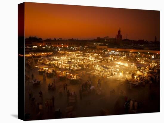 View at Sunset across DJemaa el Fna, Marrakech, Morocco, North Africa, Africa-Ian Egner-Stretched Canvas