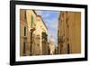 View Down a Narrow Street with Golden Stone-Eleanor-Framed Photographic Print