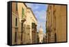 View Down a Narrow Street with Golden Stone-Eleanor-Framed Stretched Canvas