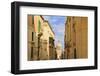 View Down a Narrow Street with Golden Stone-Eleanor-Framed Photographic Print