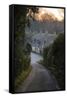 View Down Lane to Arlington Row Cotswold Stone Cottages at Dawn, Bibury, Cotswolds-Stuart Black-Framed Stretched Canvas