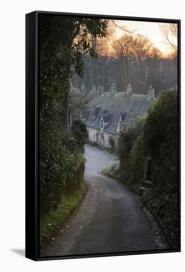 View Down Lane to Arlington Row Cotswold Stone Cottages at Dawn, Bibury, Cotswolds-Stuart Black-Framed Stretched Canvas