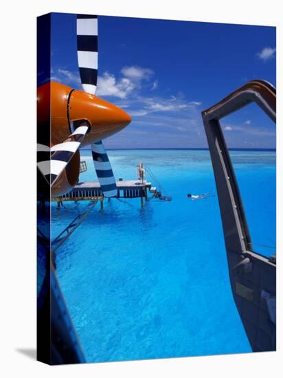 View from a Seaplane Cockpit of Man Swimming, Maldives, Indian Ocean-Papadopoulos Sakis-Stretched Canvas