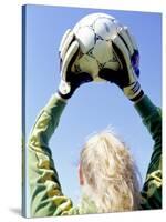 View from Behind of a Girl Holding a Soccer Ball-Steve Cicero-Stretched Canvas