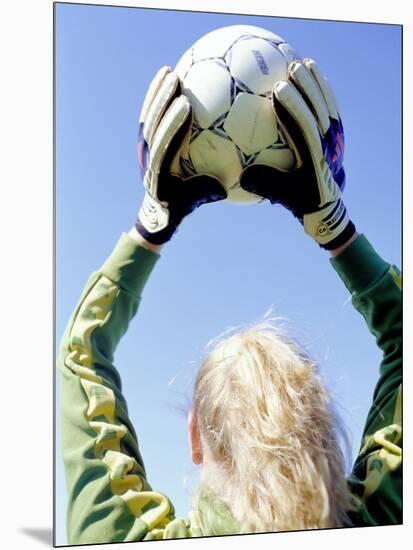 View from Behind of a Girl Holding a Soccer Ball-Steve Cicero-Mounted Photographic Print