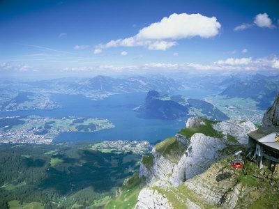 https://imgc.allpostersimages.com/img/posters/view-from-mount-pilatus-over-lake-lucerne-switzerland_u-L-P1M2A50.jpg?artPerspective=n