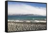 View from rocky shoreline across the stormy waters of Lake Pukaki, near Twizel, Mackenzie district,-Ruth Tomlinson-Framed Stretched Canvas