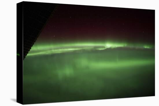 View from Space of an Aurora Borealis on Planet Earth-null-Stretched Canvas