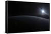 View from Space of the Sun Setting over Earth's Horizon-null-Framed Stretched Canvas