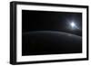 View from Space of the Sun Setting over Earth's Horizon-null-Framed Photographic Print