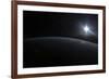 View from Space of the Sun Setting over Earth's Horizon-null-Framed Photographic Print