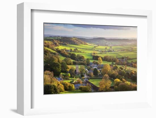 View in autumn over the village of Corton Denham and countryside at sunset, Corton Denham, Somerset-Stuart Black-Framed Photographic Print