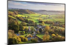 View in autumn over the village of Corton Denham and countryside at sunset, Corton Denham, Somerset-Stuart Black-Mounted Photographic Print