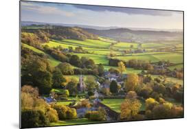 View in autumn over the village of Corton Denham and countryside at sunset, Corton Denham, Somerset-Stuart Black-Mounted Photographic Print