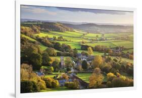 View in autumn over the village of Corton Denham and countryside at sunset, Corton Denham, Somerset-Stuart Black-Framed Photographic Print