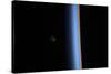 View of a Crescent Moon Rising and the Cusp of Earth's Atmosphere-null-Stretched Canvas