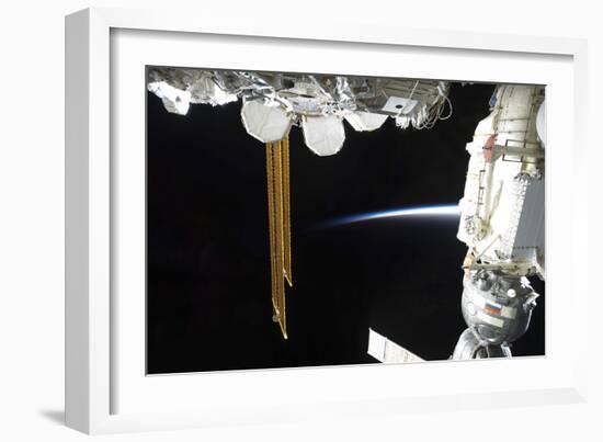 View of a Docked Russian Soyuz Spacecraft and Part of the International Space Station-null-Framed Photographic Print