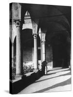 View of a Monk Walking the Grounds of a Church in Milan-Carl Mydans-Stretched Canvas