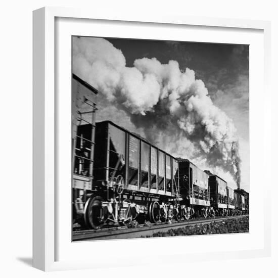 View of a Railcar Loaded with Iron Ore Moving Along the Tracks-Charles E^ Steinheimer-Framed Photographic Print