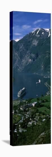 View of a Town at the Coast, Geiranger Fjord, Geiranger, More Og Romsdal, Norway-null-Stretched Canvas