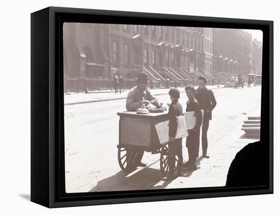 View of an Ice Cream Peddler on the Street, with Three Newsboys Buying Ice Cream, New York, c.1901-Byron Company-Framed Stretched Canvas