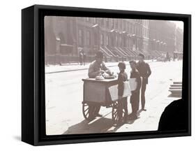 View of an Ice Cream Peddler on the Street, with Three Newsboys Buying Ice Cream, New York, c.1901-Byron Company-Framed Stretched Canvas