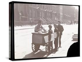 View of an Ice Cream Peddler on the Street, with Three Newsboys Buying Ice Cream, New York, c.1901-Byron Company-Stretched Canvas