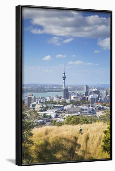 View of Auckland with Man Hiking on Mount Eden, Auckland, North Island, New Zealand, Pacific-Ian-Framed Photographic Print