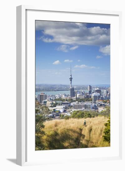 View of Auckland with Man Hiking on Mount Eden, Auckland, North Island, New Zealand, Pacific-Ian-Framed Photographic Print