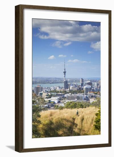 View of Auckland with Man Hiking on Mount Eden, Auckland, North Island, New Zealand, Pacific-Ian-Framed Photographic Print