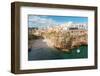 View of beach and old town on limestone cliffs, Polignano a Mare, Puglia, Italy, Europe-Karen Deakin-Framed Photographic Print