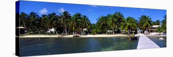 View of Beachfront from Pier, Caye Caulker, Belize-null-Stretched Canvas