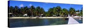 View of Beachfront from Pier, Caye Caulker, Belize-null-Stretched Canvas