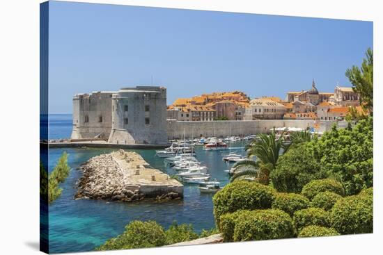 View of boats in Old Port, Dubrovnik, Dalmatian Coast, Adriatic Sea, Croatia, Eastern Europe.-Tom Haseltine-Stretched Canvas