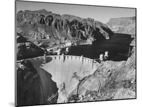 View of Boulder Dam, 726 Ft. High with Lake Mead, 115 Miles Long, Stretching Out in the Background-Andreas Feininger-Mounted Premium Photographic Print