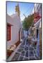 View of cafe in colourful narrow cobbled street, Mykonos Town, Mykonos, Cyclades Islands-Frank Fell-Mounted Photographic Print