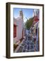 View of cafe in colourful narrow cobbled street, Mykonos Town, Mykonos, Cyclades Islands-Frank Fell-Framed Premium Photographic Print