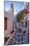 View of cafe in colourful narrow cobbled street, Mykonos Town, Mykonos, Cyclades Islands-Frank Fell-Mounted Photographic Print