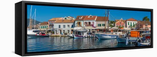 View of cafes and shops in Fiscardo harbour, Fiscardo, Kefalonia, Ionian Islands, Greek Islands-Frank Fell-Framed Stretched Canvas