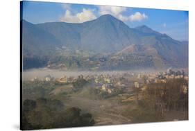 View of Champa Devi, a sacred mountain from Sneha's Care, Bhaisipati, Kathmandu, Nepal, Himalayas,-Thomas L. Kelly-Stretched Canvas