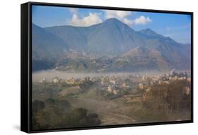 View of Champa Devi, a sacred mountain from Sneha's Care, Bhaisipati, Kathmandu, Nepal, Himalayas,-Thomas L. Kelly-Framed Stretched Canvas