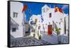View of chapel and whitewashed narrow street, Mykonos Town, Mykonos, Cyclades Islands, Aegean Sea-Frank Fell-Framed Stretched Canvas