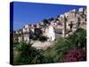 View of Church and Village on Hillside, Lumio, Near Calvi, Mediterranean, France-Ruth Tomlinson-Stretched Canvas