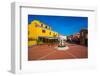 View of colourful buildings in Piazza Mediterraneo, San Teodoro, Sardinia, Italy, Mediterranean-Frank Fell-Framed Photographic Print