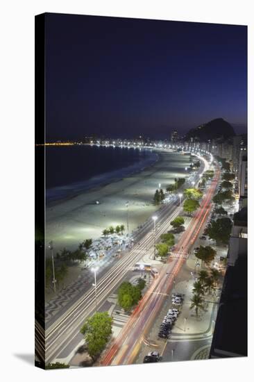 View of Copacabana Beach and Avenida Atlantica at Dusk, Copacabana, Rio de Janeiro, Brazil-Ian Trower-Stretched Canvas