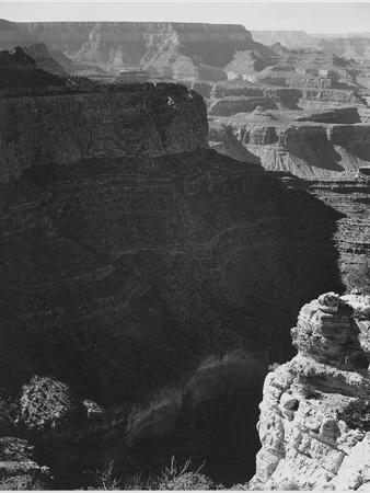 https://imgc.allpostersimages.com/img/posters/view-of-darkly-shadowed-canyon-at-left-center-from-south-rim-1941-grand-canyon-np-arizona-1941_u-L-Q1I4NKS0.jpg?artPerspective=n
